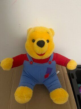 Mattel Hug 'n Wiggle Pooh Talking Plush Toy from 1997